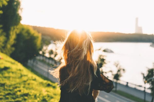 woman watching sunset