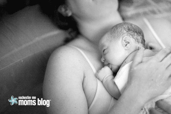 newborn on mom