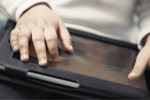 child with tablet