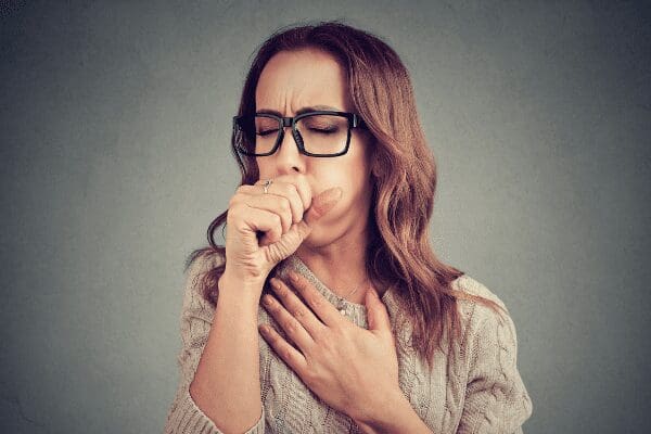 woman coughing