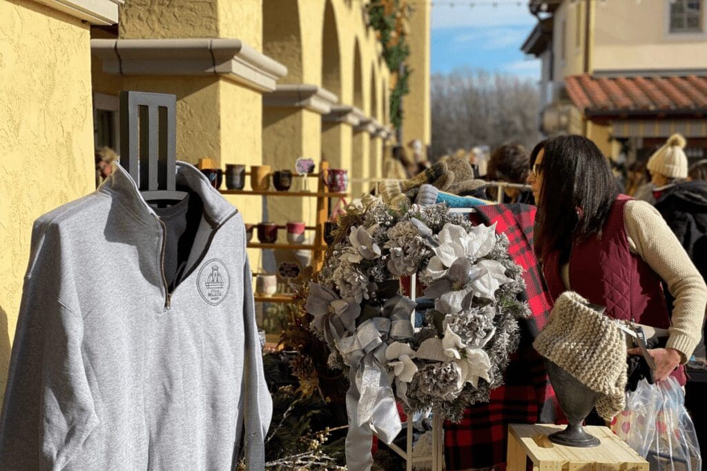 Shoppers at an outdoor Christmas market at Villa Bellezza Winery & Vineyards in Pepin, Wisconsin