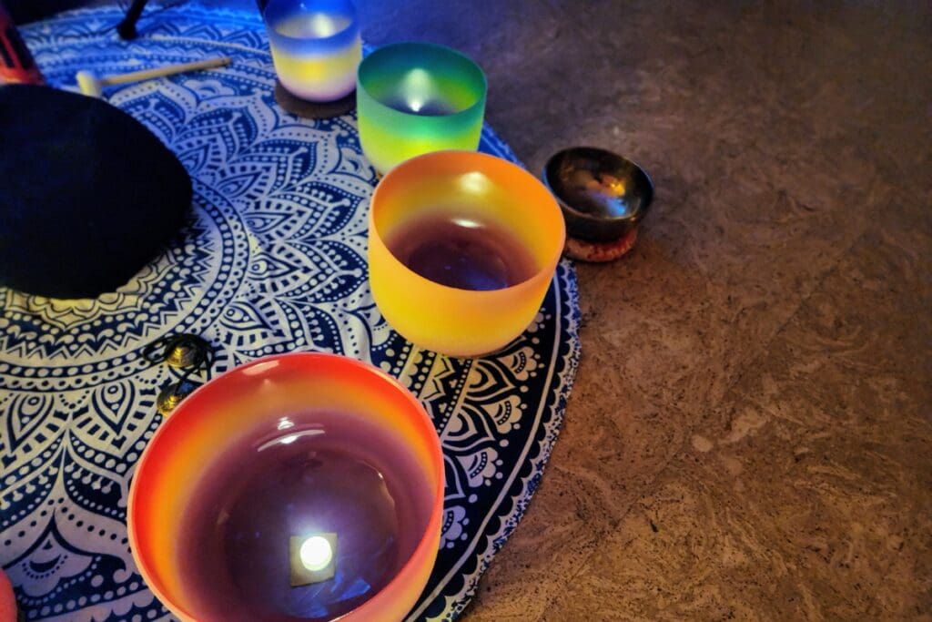 Crystal bowls representing the chakras at Hermitage Farm in Rochester, MN