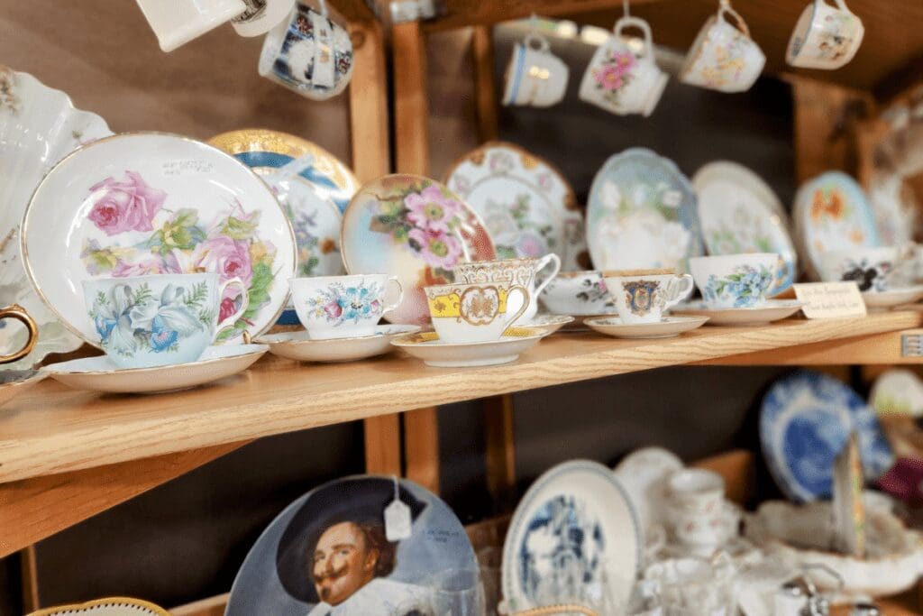 Glassware on shelves at Old Rooster Antique Mall in Rochester, MN
